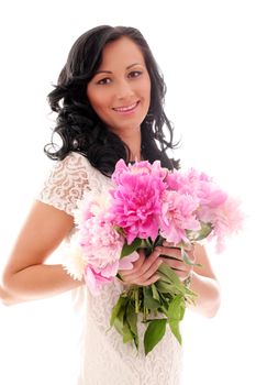 Beautiful caucasian woman with bouquet of peonies