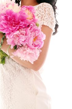 Beautiful bouquet of rose peonies in woman's hands