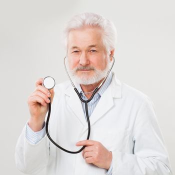 Handsome, elderly man with white beard