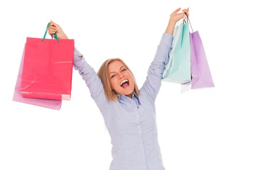 Young blond caucasian woman with shopping bags smiling over white background