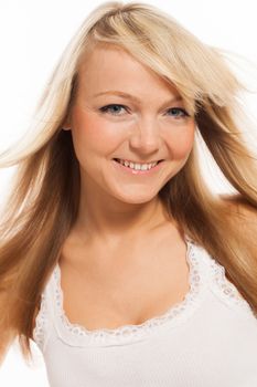 Young attractive woman posing isolated over white background
