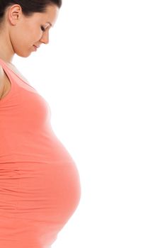 Beautiful pregnant woman isolated over white background