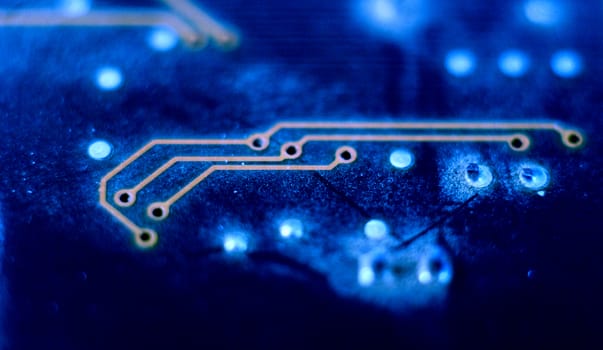 picture of a electronic, circuit, board on blue