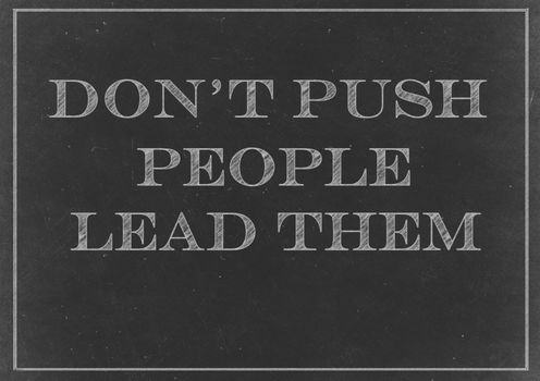 Chalkboard with Don't Push People, Lead Them message  Hand Drawn in Chalk