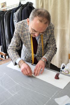 Real tailor in a small town near Assisi in Italy