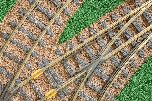macro of a model railroad track junction