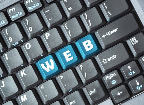 Blue web key on keyboard