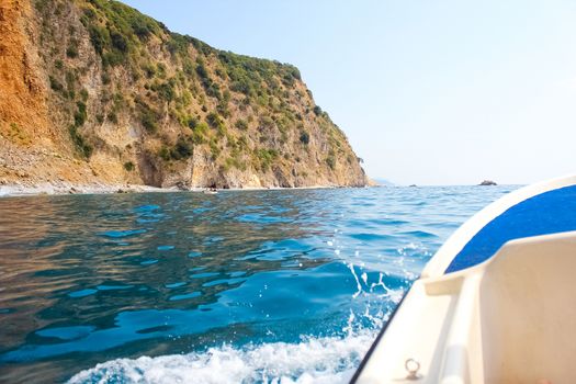 boat floats near the shore. Luxury Lifestyle