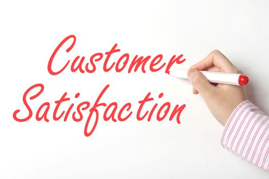 Writing customer satisfaction word on whiteboard 