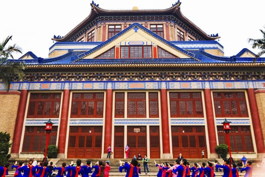 Folk Dancers Sun Yat-Sen Memorial Guangzhou City Guangdong Province China.  Sun Yat-Sen's Memorial was constructed between 1929 to 1931 and is a memorial to the person, who inspired the Chinese revolution.  Sun Yat-Sen statue was constructed 1956.