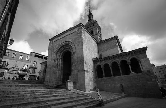 The first church ever built in Segovia, Spain, in black and white.