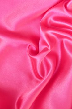 Smooth elegant pink silk or satin can use as background 