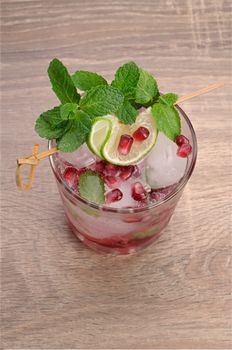 Refreshing drink with mint and lime garnet