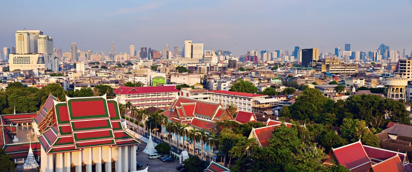 Bangkok skyline with buddist temples in the foreground