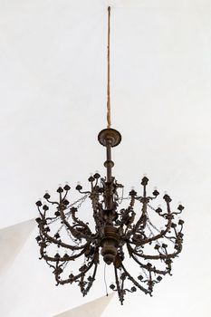 Antique chandelier in Caltagirone Gallery made of wood
