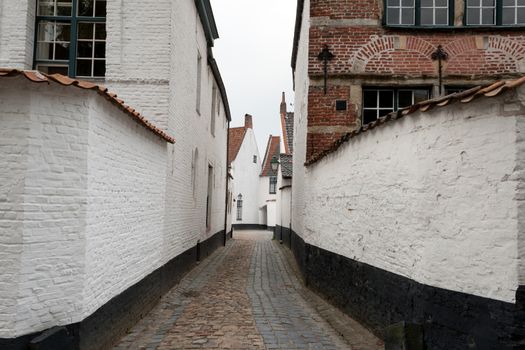 abandoned narrow street in the Beguinage Kortrijk