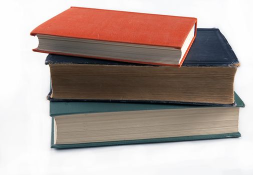 Three old historical books beautiful vintage cover on a white background