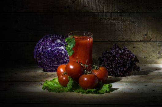 still life with tomato juice, tomatoes and vegetables