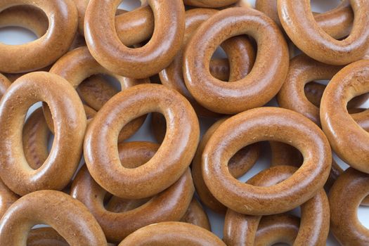 An assorted lot of bagels piled high. 