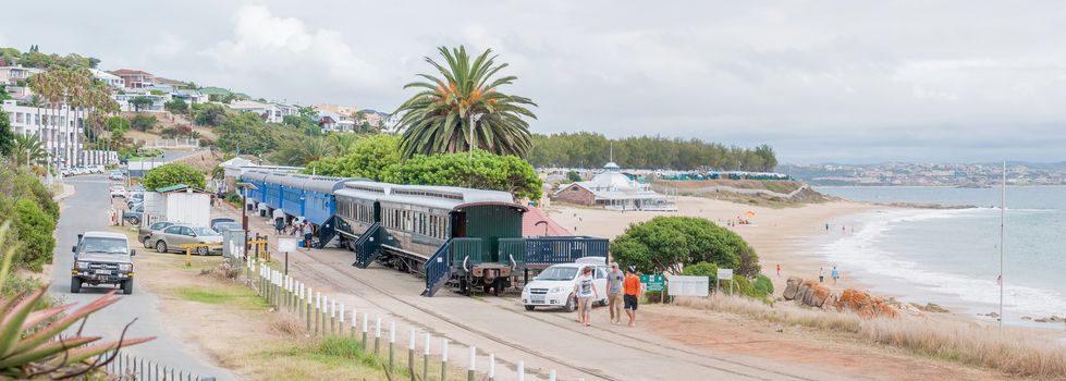 MOSSELBAY, SOUTH AFRICA - DECEMBER 30, 2014: Permanently parked railway coaches provide accomodation for visitors at the Dias beach