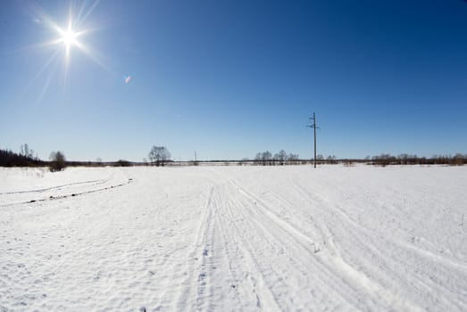 power lines against the blue sky in winter