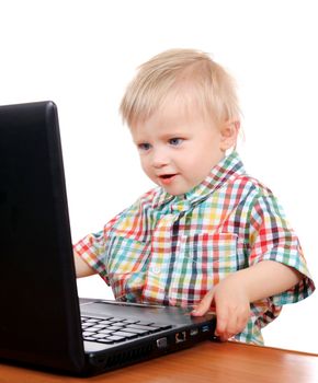 Little Child play in Laptop Isolated on the White Background