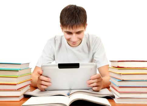 Student with Tablet Computer at the Desk with the Books on the White Background