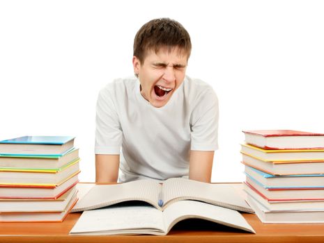 Tired Student Yawning on the School Desk Isolated on the White