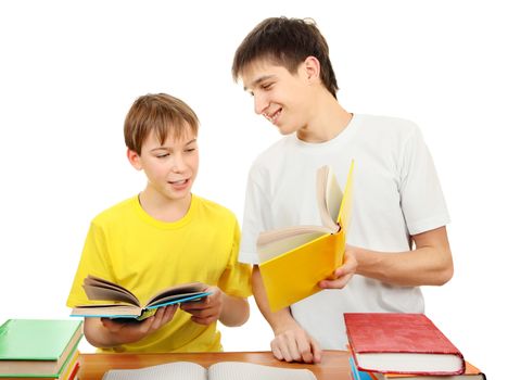 Older Brother and Little Brother doing Homework on the White Background