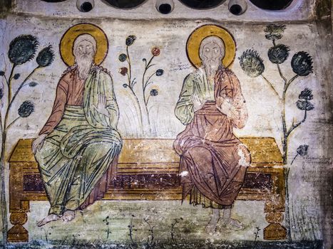 Old orthodox cave mural in a monastery in Greece