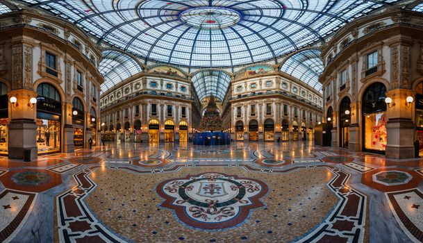 MILAN, ITALY - JANUARY 2, 2015:  Galleria Vittorio Emanuele II in Milan. It's one of the world's oldest shopping malls, designed and built by Giuseppe Mengoni between 1865 and 1877.
