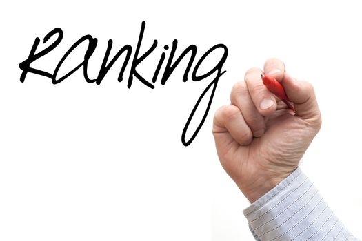 A Photo / Illustration of a Hand Writing 'Ranking'