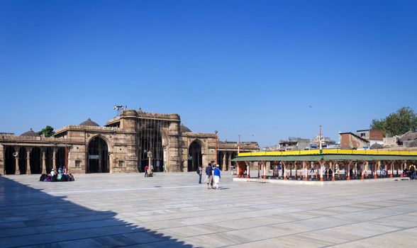 Ahmedabad, India - December 28, 2014: Muslim people at Jama Masjid also known as Jami or Jumma Mosque, is the most splendid mosque of Ahmedabad, built in 1424 during the reign of Ahmed Shah I.