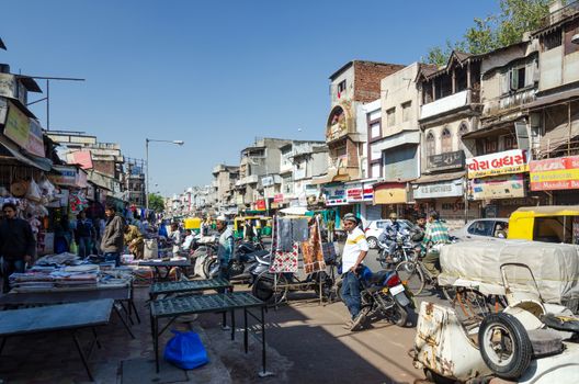 Ahmedabad, India - December 28, 2014: Unidentified Indian people on Street of the Ahmedabad city on December 28, 2014. Ahmedabad is the largest city and former capital of the western Indian state of Gujarat.