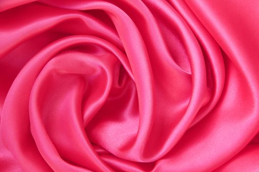 Smooth elegant pink silk or satin can use as background 