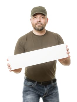 An image of a bearded man holding a white board