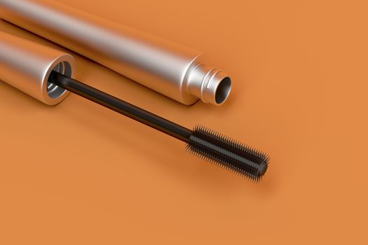 Mascara wand and tube on orange background