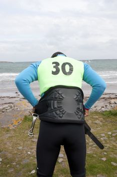 windsurfer getting ready on the beach in the maharees county kerry ireland