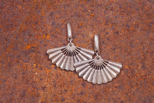 Close up of silver earrings, manufactured by Ornella Salamone