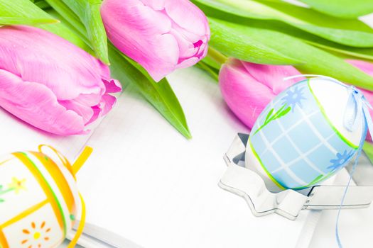 Easter eggs, tulips and easter recipe book