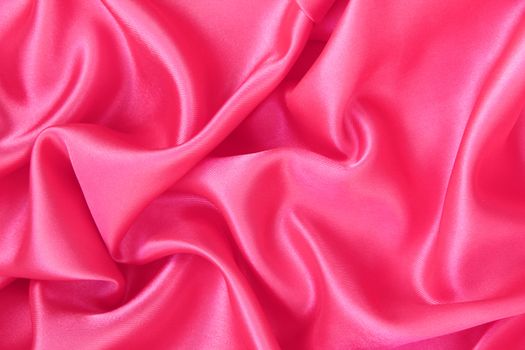 Smooth elegant pink silk or satin can use as background 