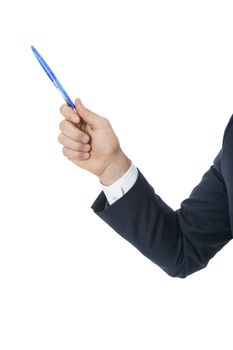 Stylish young businessman doing a presentation, making a selection or showing something pointing to the left of the frame with a pen in his hand as he stands sideways to the camera, isolated on white