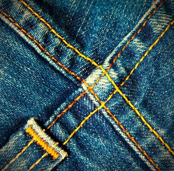 blue old jeans seams, close up
