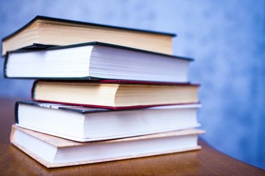 bale of book on the wooden table