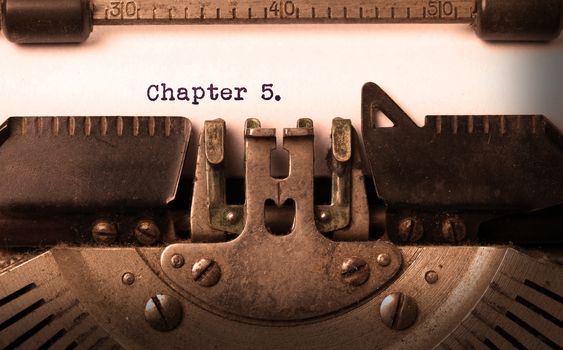 Vintage inscription made by old typewriter, chapter 5