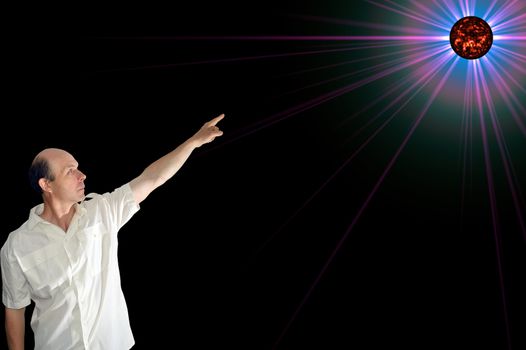 man in white shirt pointing at space object