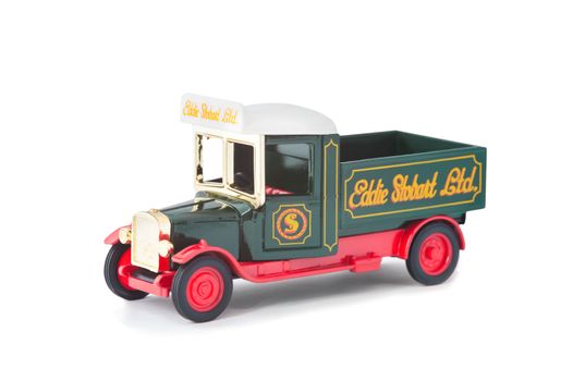 Vintage model pick-up truck manufactured by Corgi in Eddie Stobart livery on white