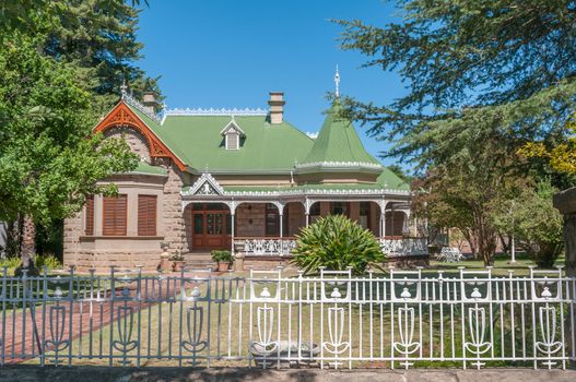 OUDTSHOORN, SOUTH AFRICA - JANUARY 2, 2015: A historic house which is also a declared national monument