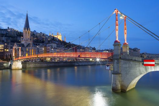 View of Lyon with Saone river and footbridge at night, France.