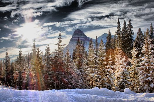 Canadian mountain peak under a blue sky